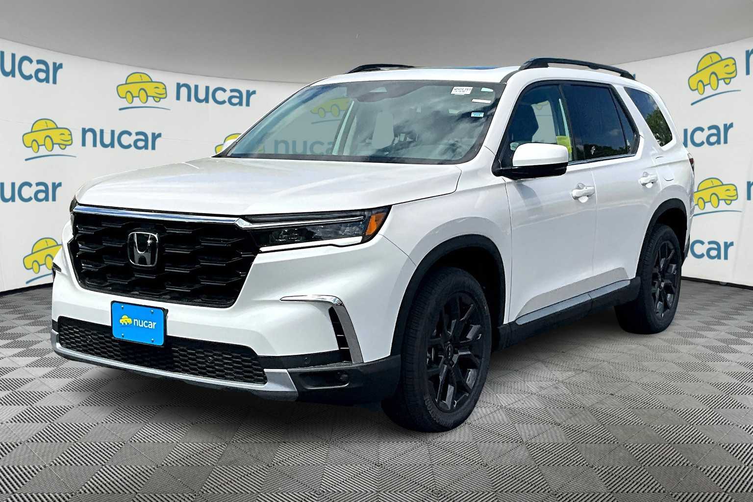 2025 Honda Pilot Touring+ - Photo 4
